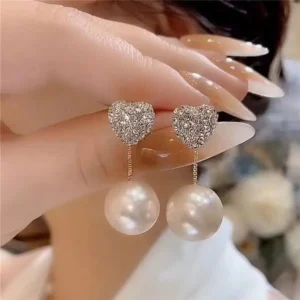 Crystal heart earrings with pearl pendant