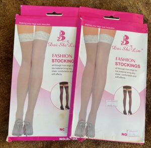 Women-s white nylon stockings with lace